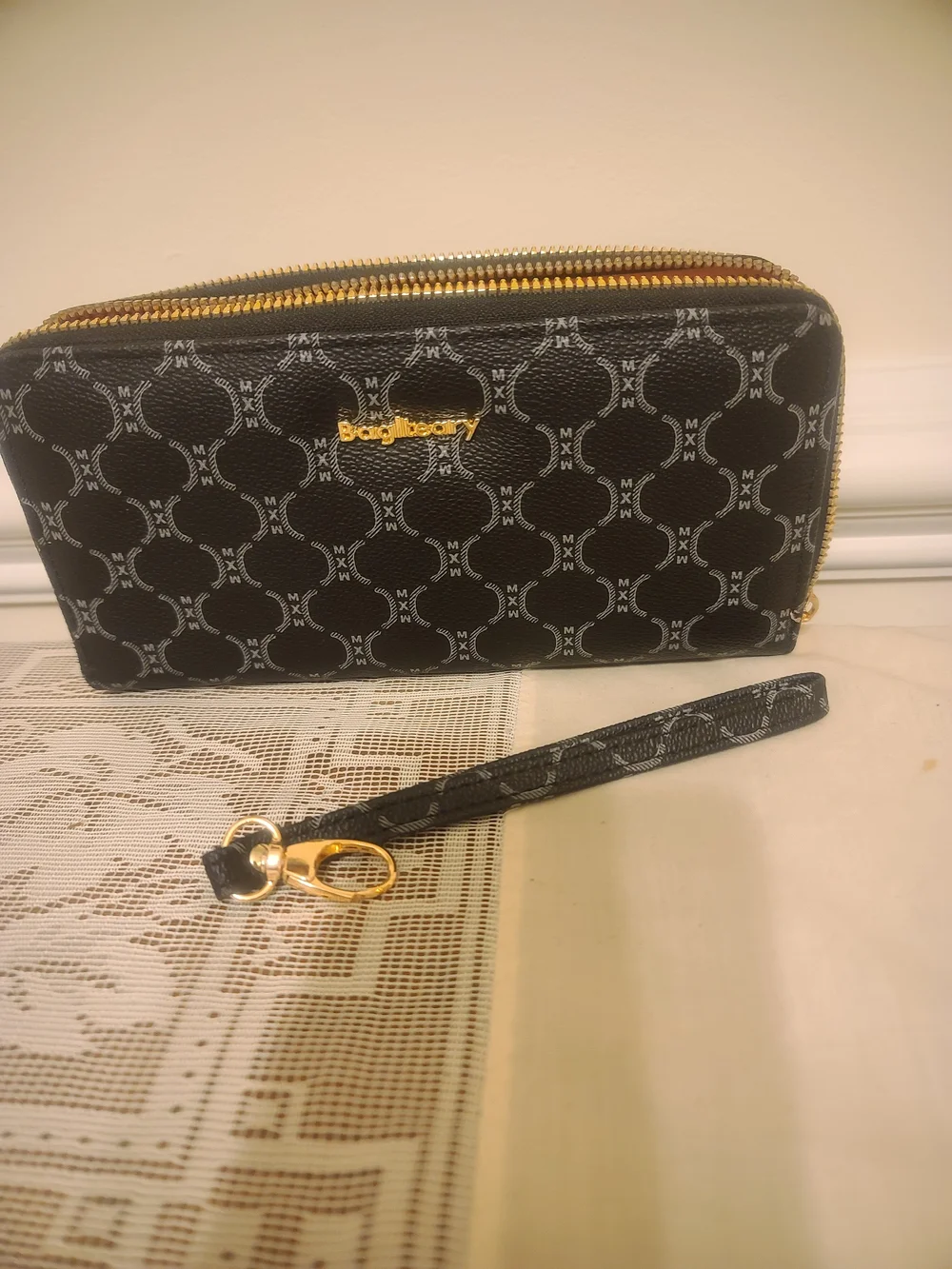 Black Patterned Zip Wallet with Gold Logo
